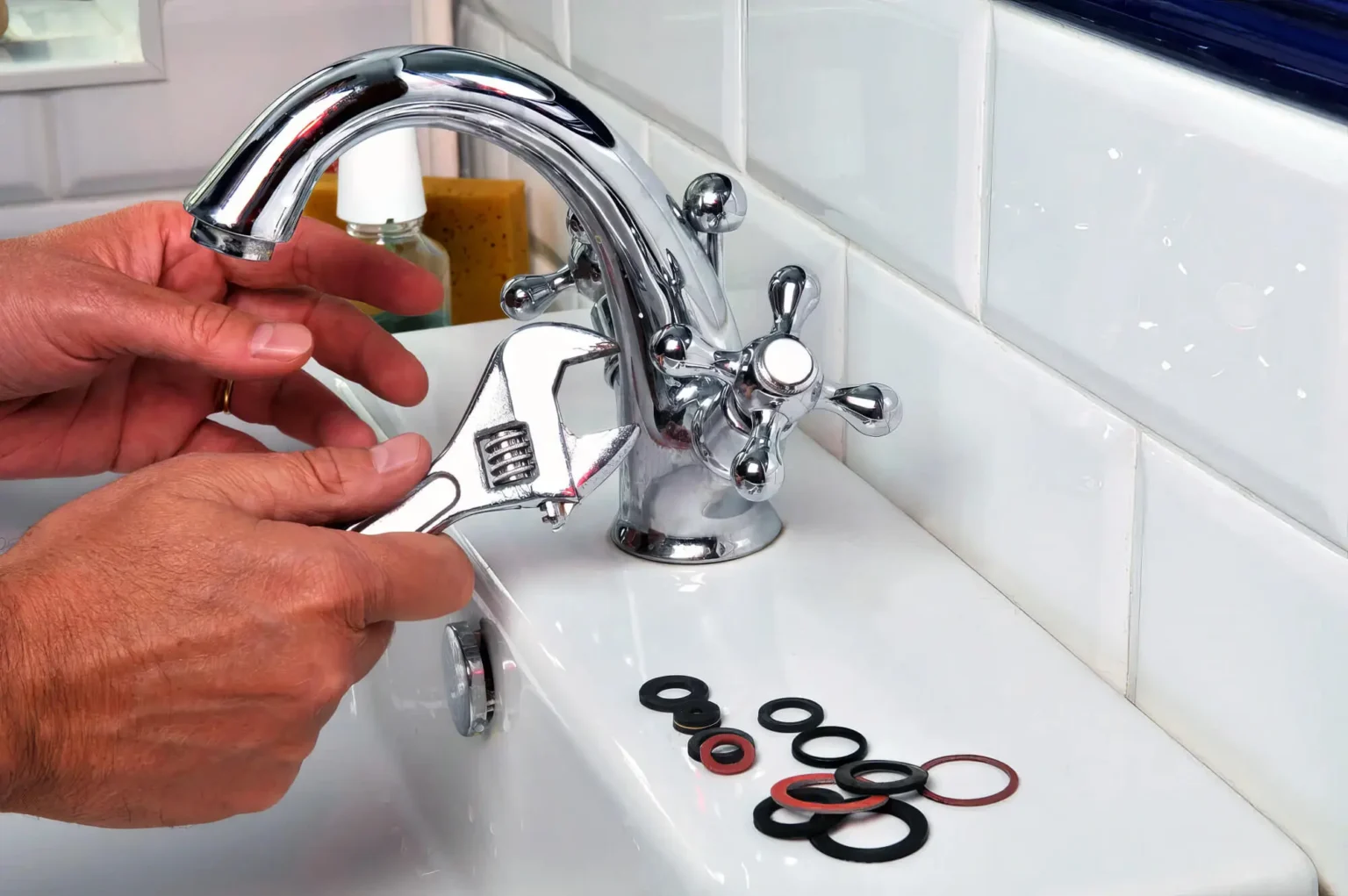 Plumber maintaining a bathroom faucet in Mountain View