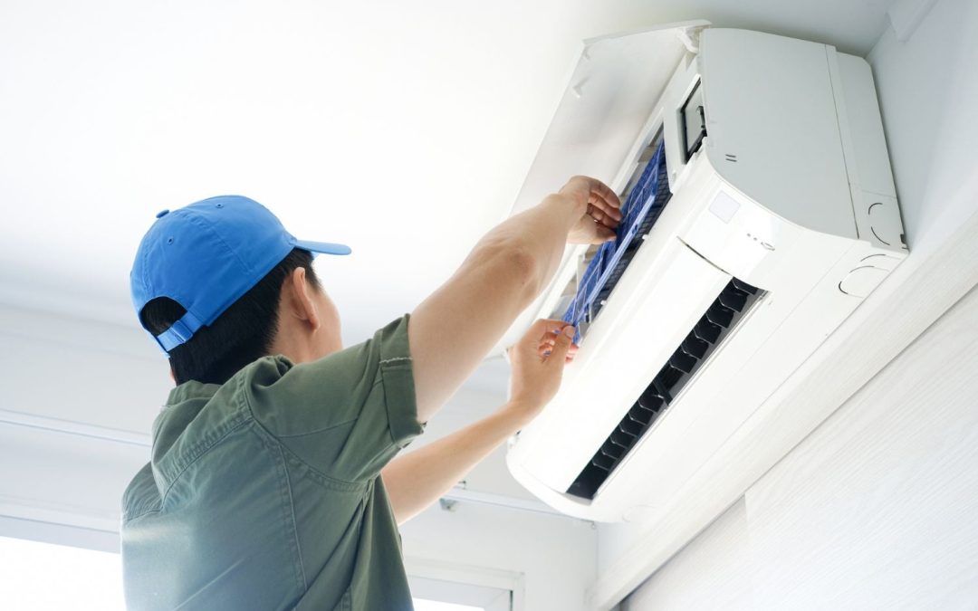 HVAC technician servicing a ductless mini split in Mountain View