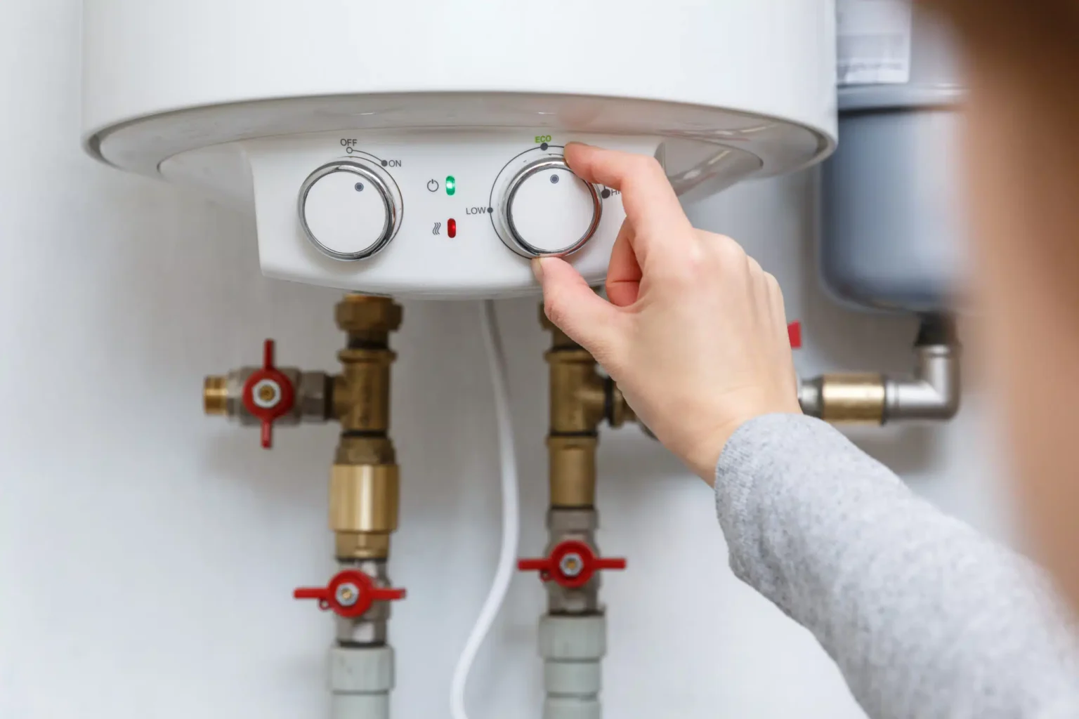 Technician adjusting a water heater in Mountain View